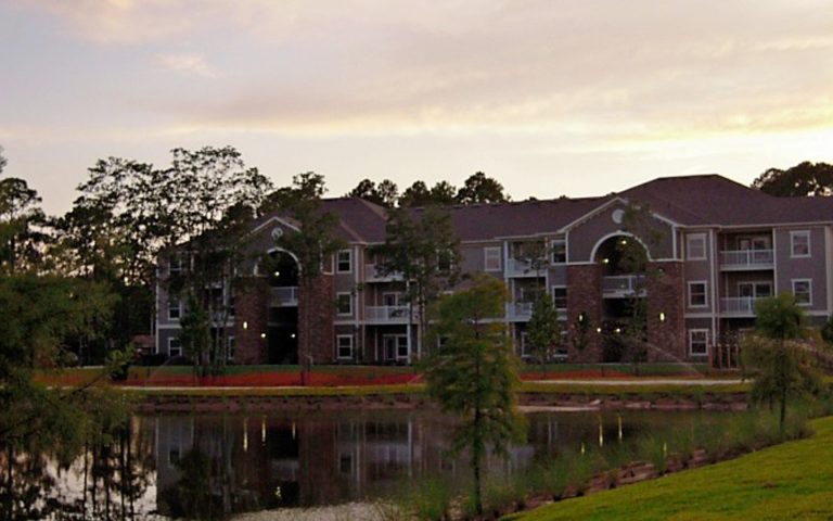 Relax on the balcony overlooking the lake at your short term rental in Panama City.